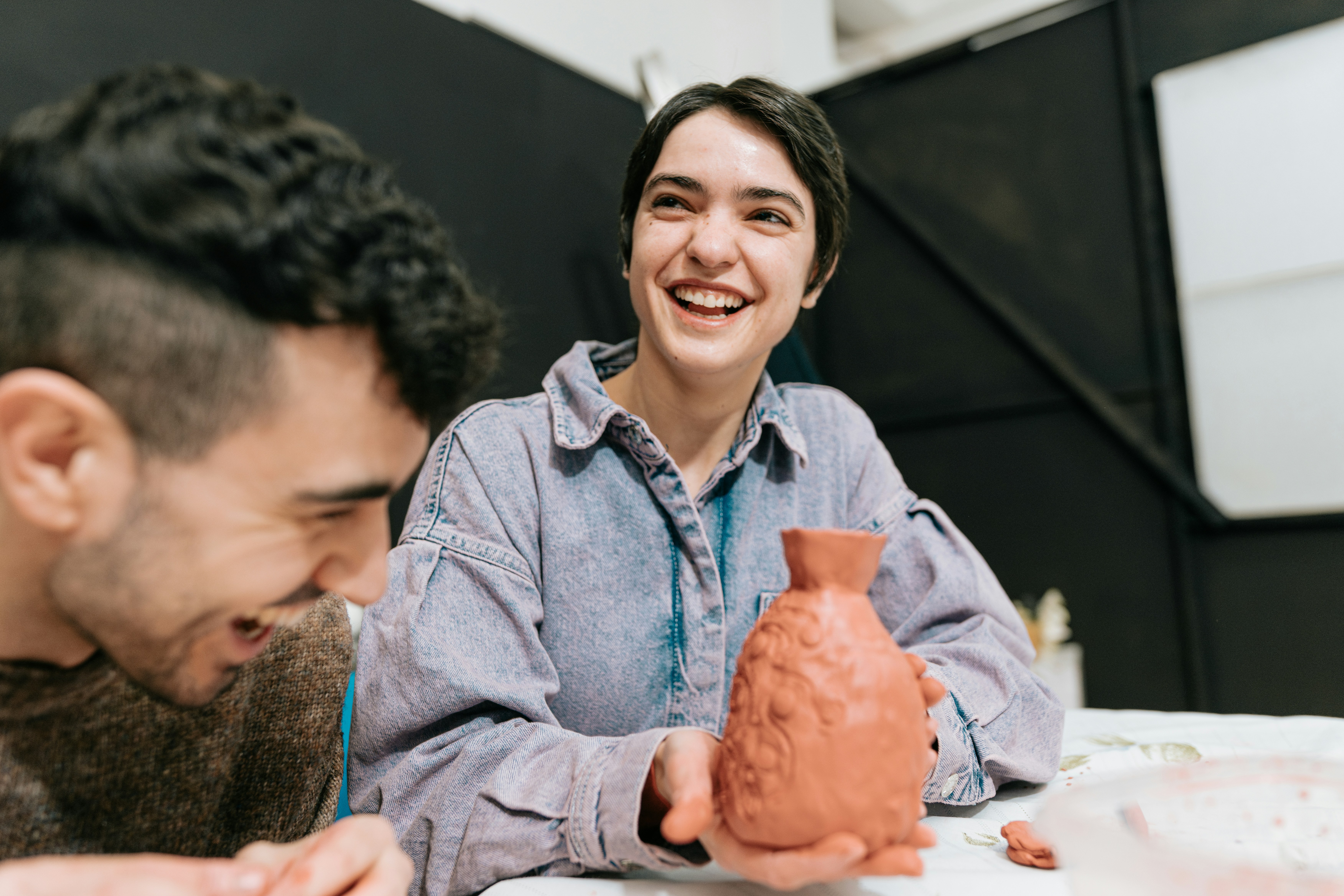 Person in a pottery workshop