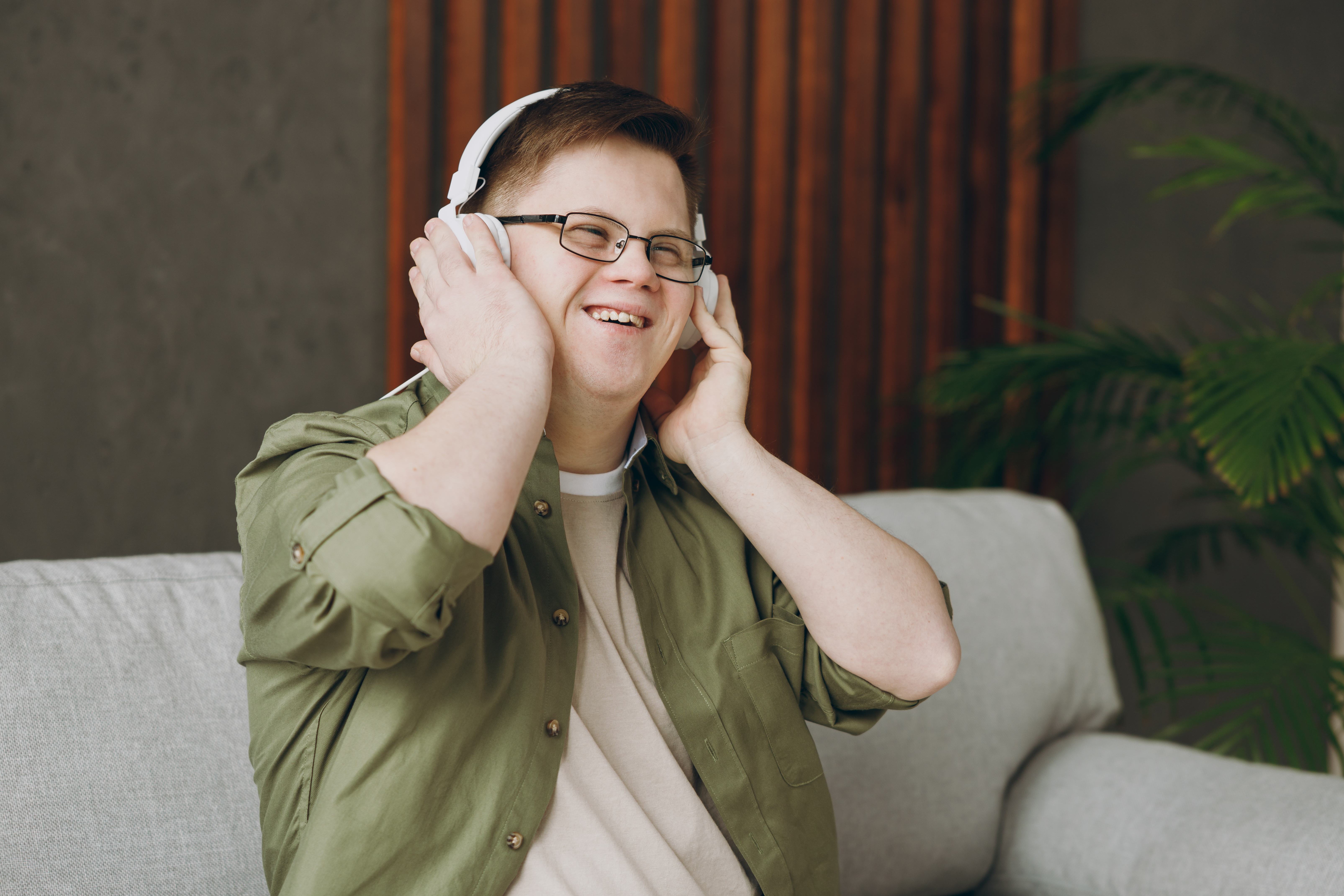 Person listening to music on headphones