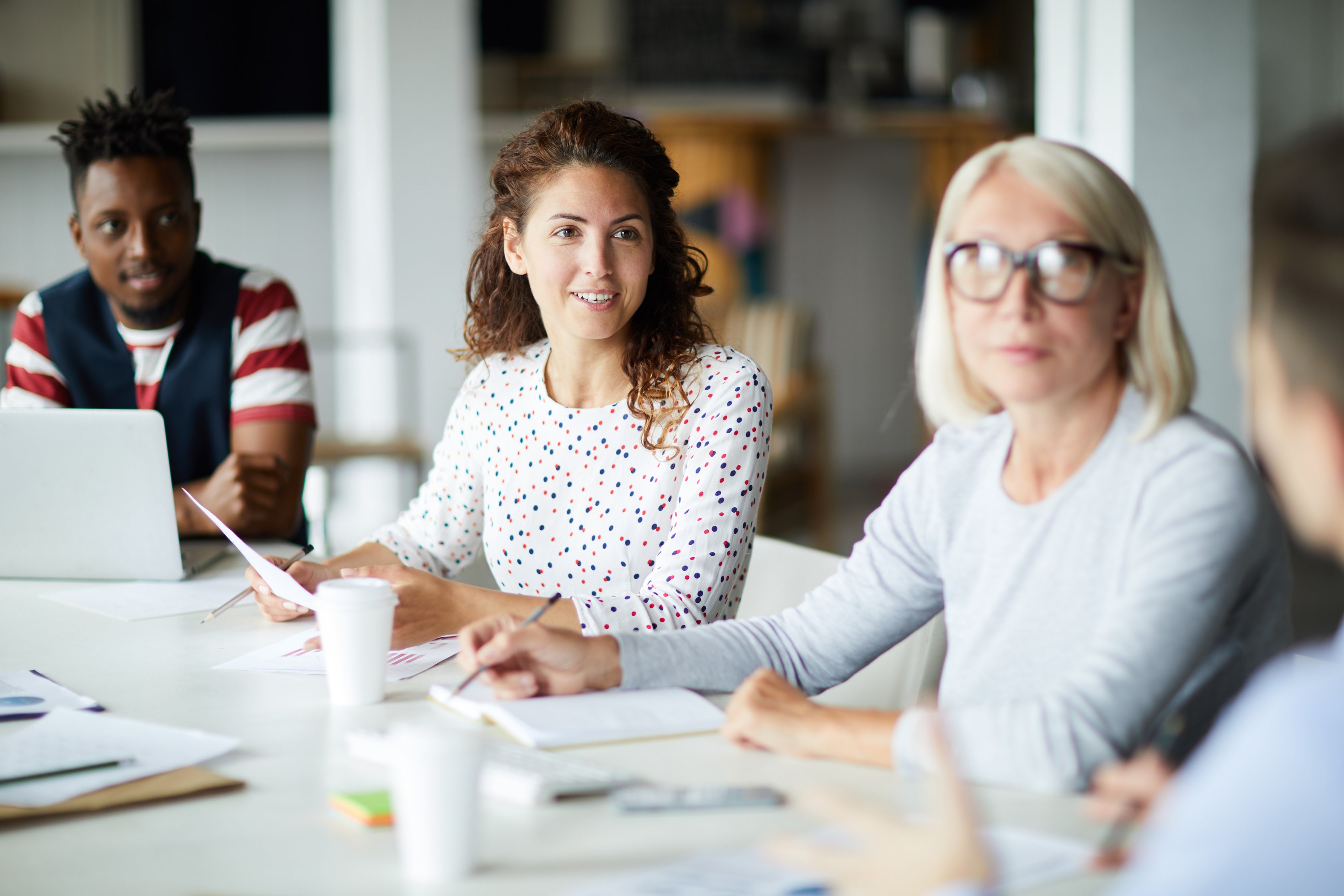 Woman speaking in meeting